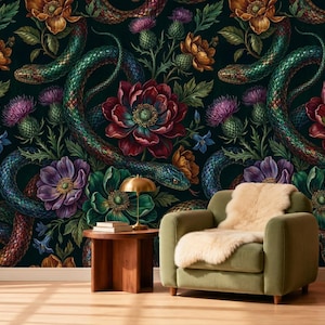 May include: A dark wallpaper featuring a repeating pattern of green snakes intertwined with vibrant red, purple, and orange flowers and thistle plants. The design is set against a black background, creating a dense, botanical, and reptilian motif.