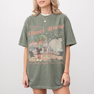 Comfort Colors Mickey Disneyworld shirt featuring a retro Mickey and Friends design. Perfect for your 2026 Disney trip or Disney vacation. Celebrate your magical experience with this stylish tee, ideal for family trips, group outings, and park days at Walt Disney World and Magic Kingdom. A must-have for Disney lovers! Mickey graphic tee for all ages.