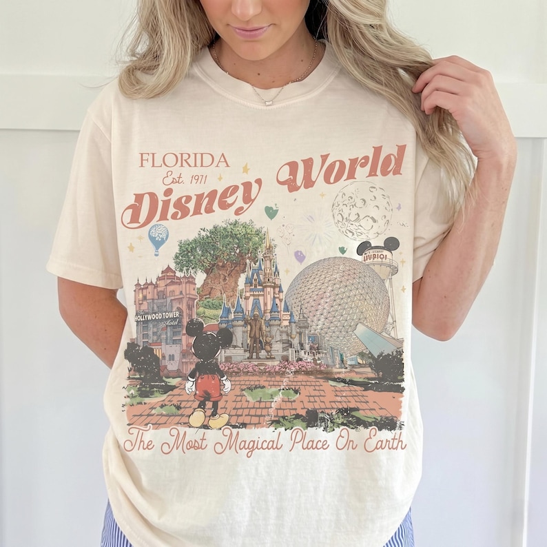 Comfort Colors Mickey Disneyworld shirt featuring a retro Mickey and Friends design. Perfect for your 2026 Disney trip or Disney vacation. Celebrate your magical experience with this stylish tee, ideal for family trips, group outings, and park days at Walt Disney World and Magic Kingdom. A must-have for Disney lovers! Mickey graphic tee for all ages.