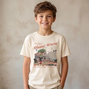 Comfort Colors Mickey Disneyworld shirt featuring a retro Mickey and Friends design. Perfect for your 2026 Disney trip or Disney vacation. Celebrate your magical experience with this stylish tee, ideal for family trips, group outings, and park days at Walt Disney World and Magic Kingdom. A must-have for Disney lovers! Mickey graphic tee for all ages.