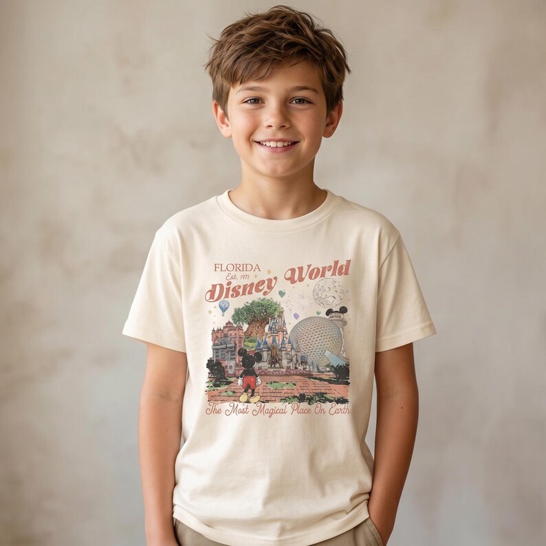 Comfort Colors Mickey Disneyworld shirt featuring a retro Mickey and Friends design. Perfect for your 2026 Disney trip or Disney vacation. Celebrate your magical experience with this stylish tee, ideal for family trips, group outings, and park days at Walt Disney World and Magic Kingdom. A must-have for Disney lovers! Mickey graphic tee for all ages.