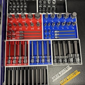 May include: A blue toolbox organizer with various sockets and bits, neatly arranged in red, blue, and black trays. The image includes sizes in inches and the text "ATLAS WORKS CO." and "*Tools NOT Included*".