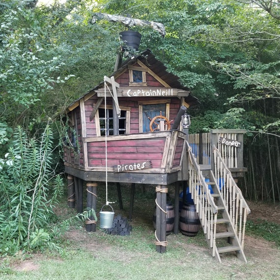 outdoor playhouse with doorbell