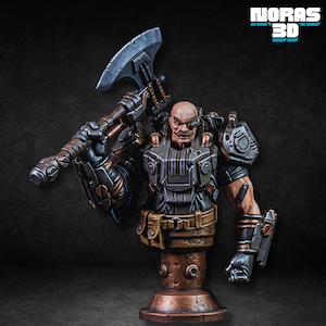 May include: A detailed bust of a bald, mustached figure with a cybernetic eye and armor, holding a large axe. The figure is painted in shades of gray, brown, and copper, with the text "NORAS 3D" in the upper right corner.