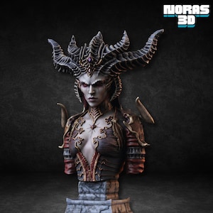 May include: A detailed bust of a female demon with a crown of horns, intricate armor, and a stern expression. The sculpture features a dark color palette with red and gold accents. The text "NORAS 3D" is visible in the upper right corner.