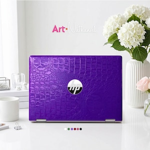 May include: A purple laptop skin with a glossy, textured crocodile skin pattern applied to the lid of an HP laptop. The skin features a realistic embossed scale design in a vibrant violet hue, centred around the circular silver HP logo.