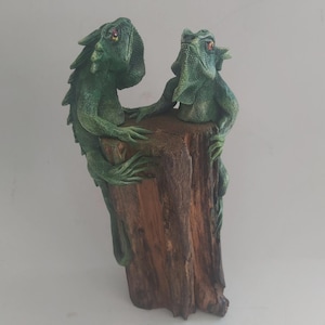 Dubbelleguan på teakträ / lerskulptur / Heminredning / Utomhusinredning.