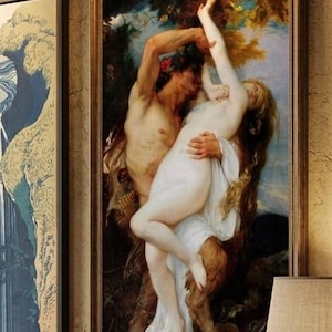 May include: A framed oil painting depicting a mythological scene with a satyr figure holding a pale, draped figure in a forest setting. The artwork features rich earth tones, deep greens, and soft highlights, encased in a simple gold-toned frame.