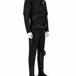 May include: A black costume displayed on a mannequin. The outfit includes a high-collared top, pants, and boots. A belt with a buckle and a shoulder strap with pouches are also visible. The costume has a sleek, modern design.