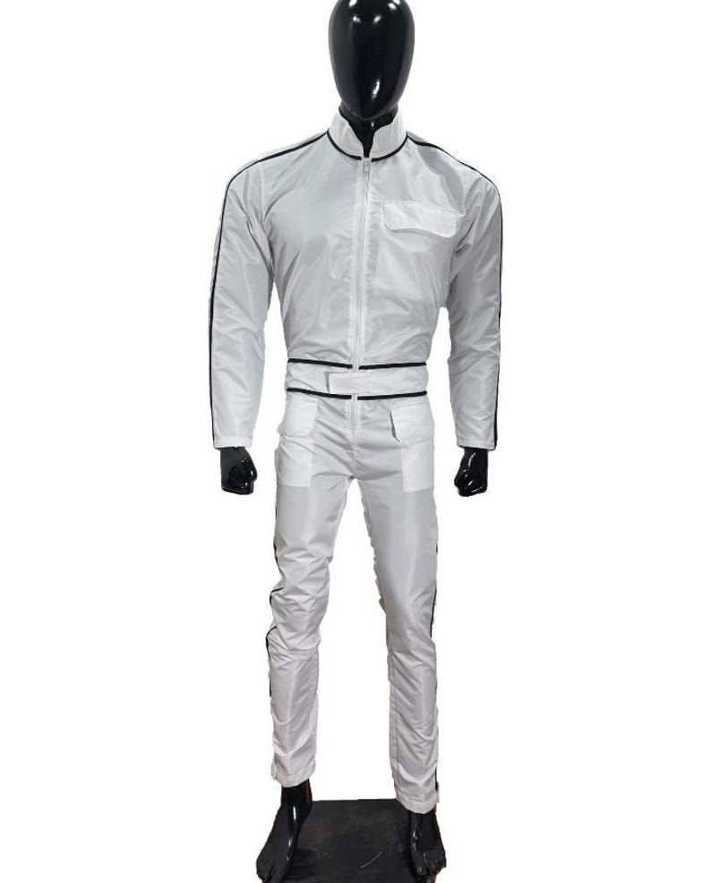 May include: A white racing suit with black trim, displayed on a mannequin. The suit features a zip-up jacket with a stand-up collar, a chest pocket, and matching pants. The suit has black stripes down the sleeves and legs.