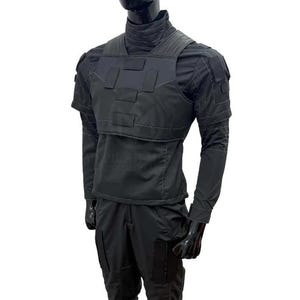 May include: Black tactical outfit displayed on a mannequin. The outfit includes a high-neck shirt, a vest with rectangular panels, long sleeves, and matching pants. The ensemble is designed for a functional and utilitarian aesthetic.