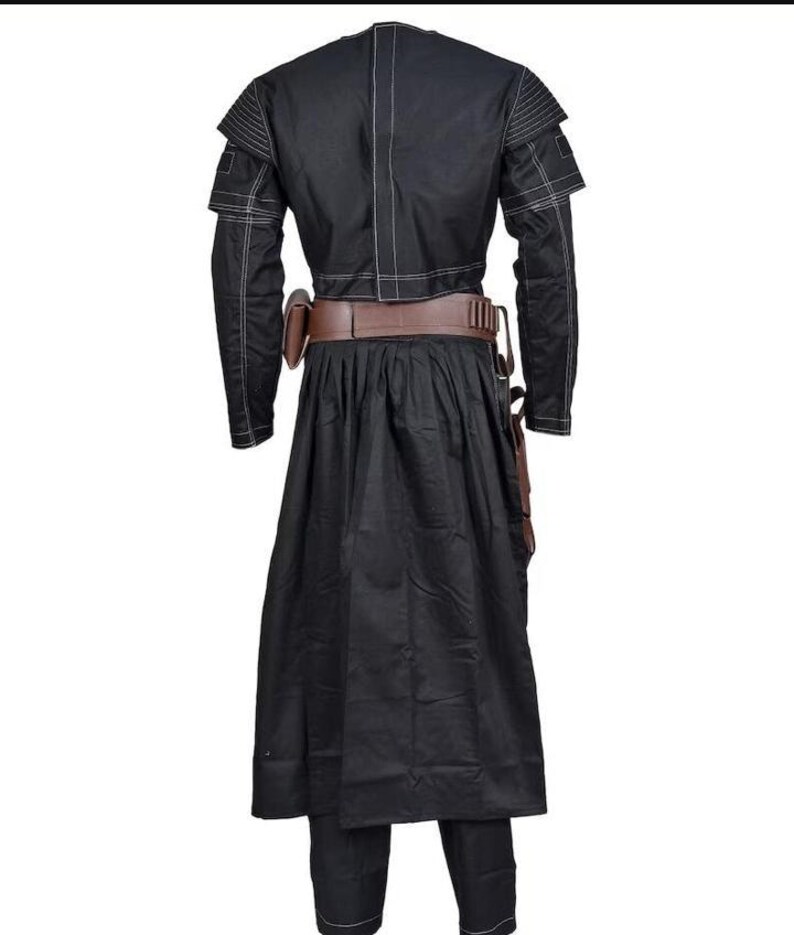 May include: Black costume with white stitching details. The outfit includes a long-sleeved jacket with shoulder accents, a long skirt, and matching pants. A brown belt and pouches complete the ensemble. The costume is designed for cosplay or themed events.