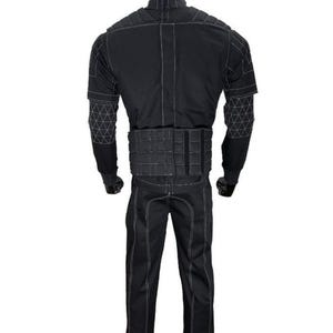 May include: Black tactical jumpsuit with white stitching details. The suit features a high collar, padded shoulders, and a segmented belt. The sleeves have a geometric pattern on the upper arms. The pants have a straight leg design.