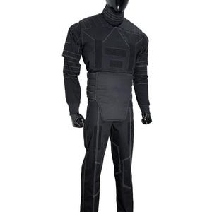 May include: Black tactical suit with white stitching, displayed on a mannequin. The suit includes a high collar, long sleeves, and reinforced panels on the chest, abdomen, and legs. The pants have multiple reinforced sections. The mannequin has a black head.