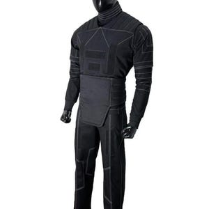 May include: Black tactical suit with white stitching, displayed on a mannequin. The suit includes a high collar, long sleeves, and pants. The design features reinforced panels and a segmented chest area, suggesting protective functionality.