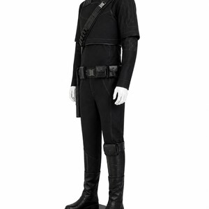 May include: A black costume with a high collar, shoulder armor, and a utility belt. The outfit includes a long-sleeved shirt, pants, and knee-high boots. The costume is displayed on a mannequin against a white background.
