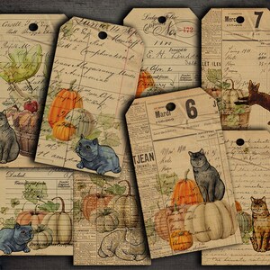 May include: A set of six vintage-style printable tags featuring cats, pumpkins, and fall foliage. The tags are printed on a distressed paper background with handwritten text and numbers.