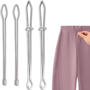 May include: Four silver metal drawstring threaders with elongated loops at the top and a solid base, displayed alongside a pair of mauve sweatpants featuring an elastic waistband with a drawstring cord being pulled through the fabric eyelet.