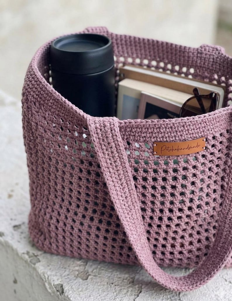 May include: A set of three ceramic mugs with a speckled, matte finish. The mugs are in shades of cream, light gray, and dark gray. Each mug has a simple, minimalist design, perfect for coffee or tea.