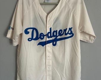 Maglia da baseball Los Angeles Dodgers Jackie Robinson #42 UCLA Health bianca e blu, taglia M