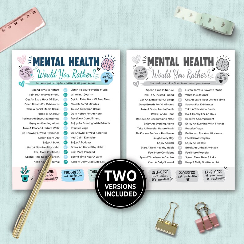 May include: Two printed sheets titled Mental Health Would You Rather with lists of choices, featuring a pink ruler, gold pen, two binder clips, and patterned tape. The sheets include text like Be Kind To Your Mind and You Matter, with a brain icon.