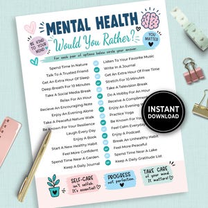 May include: A printed mental health would you rather game sheet featuring a list of self-care choices, blue and pink decorative accents, a brain illustration, and the text "INSTANT DOWNLOAD" in a black circle, accompanied by a gold pen.