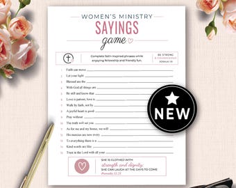 May include: A white paper game sheet with the text "WOMEN'S MINISTRY SAYINGS game" in pink. The game includes fill-in-the-blank phrases and a "NEW" sticker. A gold pen and glasses are in the image.