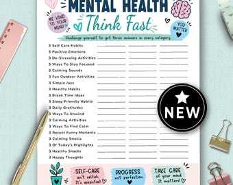 May include: A white Mental Health Think Fast worksheet with prompts for self-care, emotions, and activities. The design includes hearts, a brain graphic, and the word "NEW" in a black circle. A gold pen and pink ruler are visible.