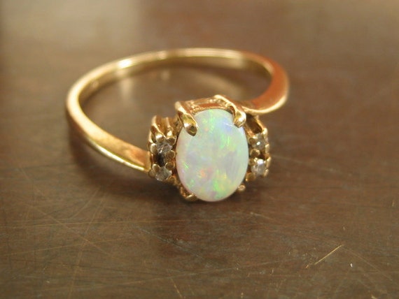 Items similar to CHRISTMAS HOLIDAY SALE solid 10k gold opal and 4 ...