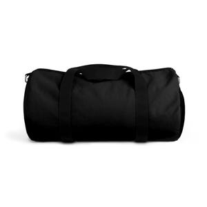 May include: A black duffel bag with a cylindrical shape. The bag has two short handles and a longer, adjustable strap for carrying. The bag is made of a durable material and is suitable for travel or gym use.