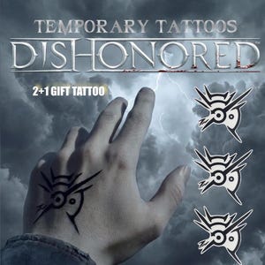 May include: Temporary tattoos featuring the Dishonored logo and text. The image shows a hand with a tattoo of the logo, along with three additional logo stickers. The background is a stormy sky with lightning.