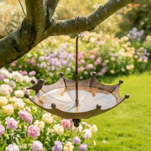 May include: A white ceramic mug with a black handle and the text "But First, Coffee" in a black, handwritten-style font. The mug is on a white surface.