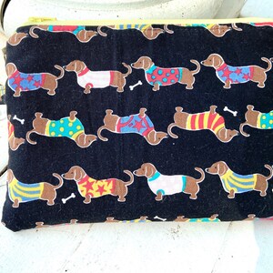 Doxie Wristlet evening bag with slots for essential oils or lipstick