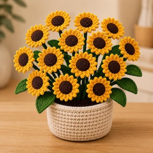 May include: A handcrafted crochet sunflower arrangement in a beige pot. The sunflowers have yellow petals and brown centers, with green leaves. The pot is round and has a textured, woven appearance. A charming, decorative floral display.