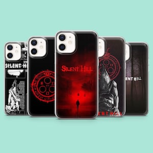Puede incluir: Una colección de fundas para teléfonos con diseños inspirados en el videojuego Silent Hill. Las fundas muestran varios gráficos, incluyendo el logotipo del juego, una silueta en un entorno rojo y otras imágenes temáticas.