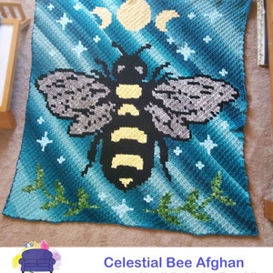 May include: A crochet afghan featuring a bee with yellow and black stripes, surrounded by stars and crescent moons. The background is a gradient of blue and teal. The text "Celestial Bee Afghan tested by Marji Reineke Franklin" is at the bottom of the image.