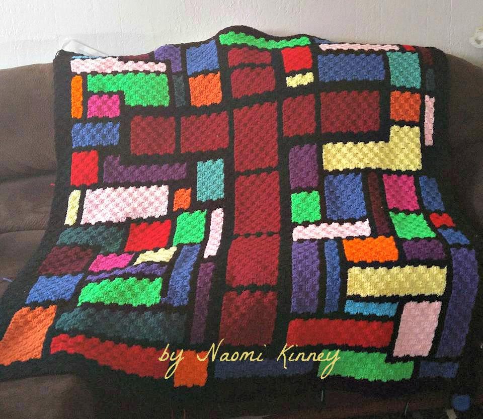 21 Stained Glass Crochet Patterns for Colorful Blankets, Squares, and More 11 Stained Glass Cross Afghan C2C Crochet
