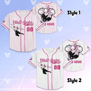 May include: Two baseball jerseys, one striped and one solid white, featuring a Ghost-Spider graphic. The jerseys have pink accents, the number "00", and the text "Ghost-Spider". Style 1 is striped, and Style 2 is white.