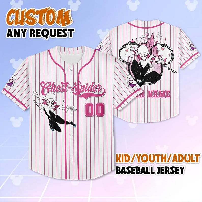 May include: White and pink pinstripe baseball jersey featuring a Ghost-Spider graphic. The jersey has a button-up front, a pink collar, and the text "Ghost-Spider" on the front. The back of the jersey has a graphic of Ghost-Spider and the text "NAME".