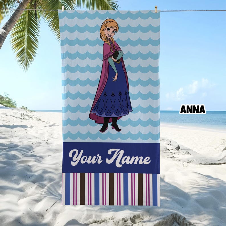 May include: A rectangular beach towel featuring a cartoon character with braided hair wearing a dark blue dress and magenta cape. The background has light blue waves, a dark blue section with the text Your Name, and vertical brown and purple stripes.