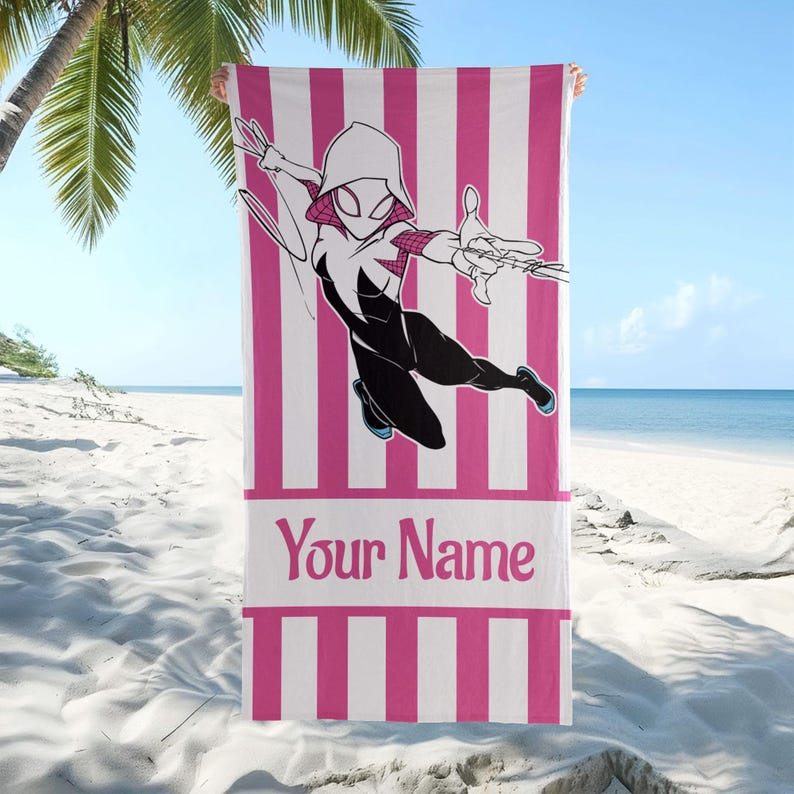 May include: A rectangular beach towel featuring vertical pink and white stripes. The center displays a graphic of a character in a white, black, and pink hooded suit in a dynamic pose. Below the character, the text Your Name is printed in pink.