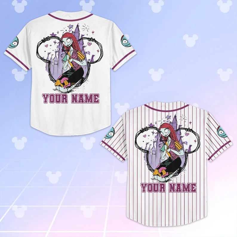 May include: Two baseball jerseys, one white and one striped, featuring a cartoon character design. The design includes a character with red hair, a purple castle, and the text "YOUR NAME" in a purple font. The jerseys have purple accents.