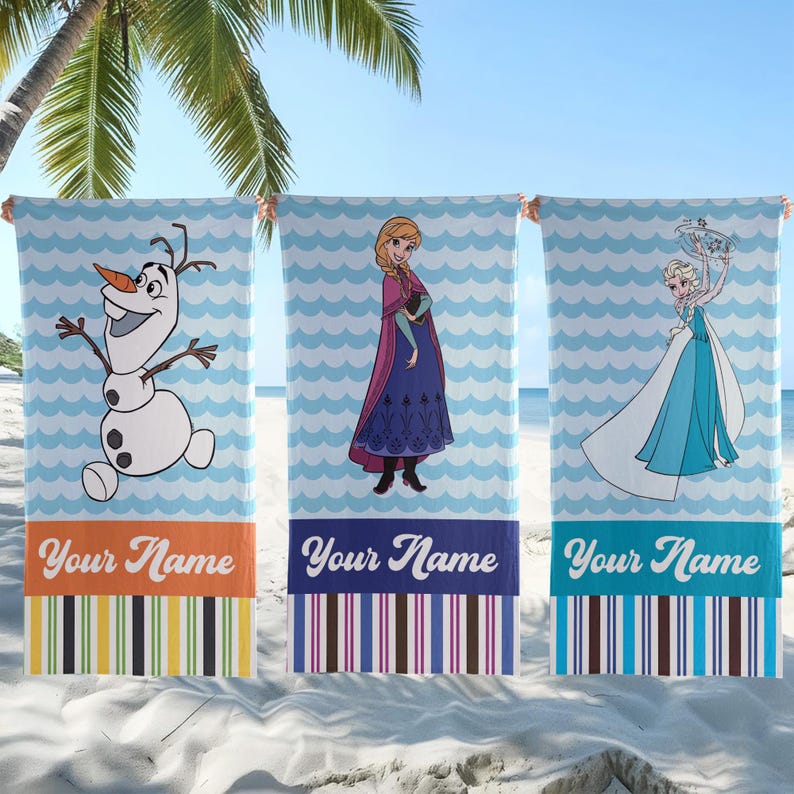 May include: Three rectangular beach towels featuring Frozen characters Olaf, Anna, and Elsa. Each towel has a light blue wavy background, a solid color block with the text Your Name, and a vertical striped pattern in shades of brown, green, and blue.
