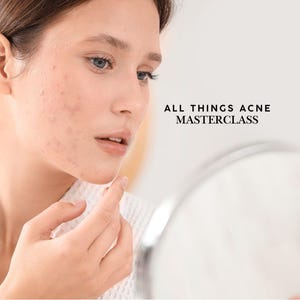 May include: A person in a white robe looks at their face in a mirror, with visible acne. The image includes the text "ALL THINGS ACNE MASTERCLASS" in black. The focus is on skincare and acne treatment.