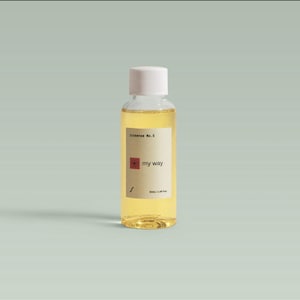 May include: A clear glass bottle with a white cap, filled with a yellow liquid. The label reads "Eisense No. 5" and "my way" with a red and white design. The bottle contains 1.69 fl oz of liquid.
