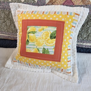 Handmade quilted pillow, lemon print orange, decorative throw, patchwork design, cotton fabric, multicolored, chenille