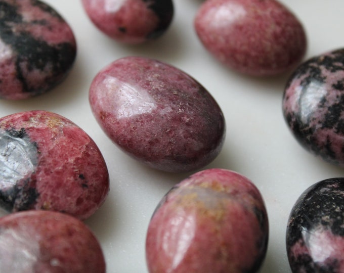 The RESCUE CRYSTAL Rhodonite Pocket Stone