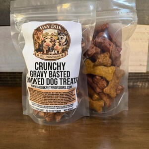 May include: A set of three ceramic nesting bowls in shades of blue, green, and white. The bowls feature a speckled glaze and a simple, modern design. The largest bowl is approximately 7 inches in diameter.