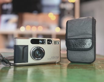 Cámara compacta de película Contax T2 Titanium Silver Premium probada - Fotografía analógica de 35 mm - Correa original incluida