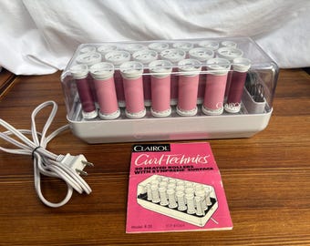 Juego de rulos térmicos Clairol Curl Technics vintage de los años 80, color rosa, en perfecto estado de funcionamiento. Herramienta de belleza retro completa.